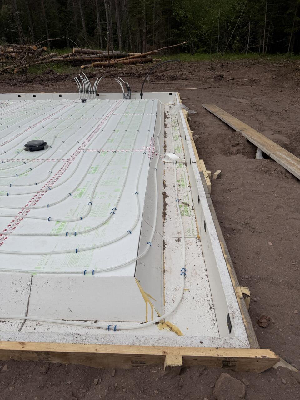 Eco Foam concrete slab forms and sub slab board with radiant tubing before the pour